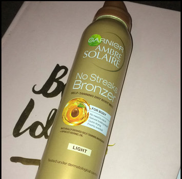 Photo of Garnier Ambre Solaire No Streaks Bronzer Self-Tanning Dry Face Mist uploaded by Kenzie R.