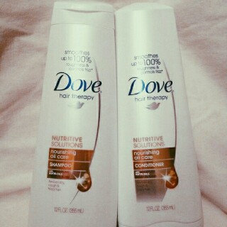 Photo of Dove Damage Therapy Nourishing Oil Care Conditioner uploaded by Andrea C.