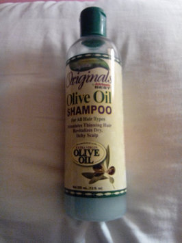 Photo of Organic Root Stimulator Olive Oil Creamy Aloe Shampoo uploaded by Kayla S.