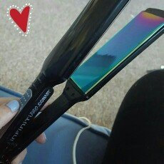 Photo of Conair Infiniti Pro Rainbow Titanium Flat Iron uploaded by Saige E.