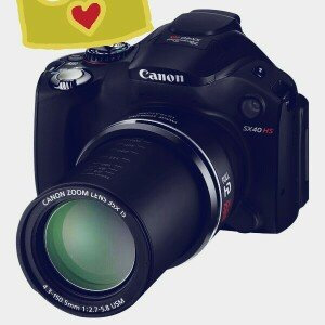 Photo of Canon EOS 7D Mark II GPS Digital SLR Camera & EF-S 18-135mm & 70-300mm IS Lens + 64GB Card + Backpack + Flash + Battery + Tripod + Kit uploaded by Luisanny D.