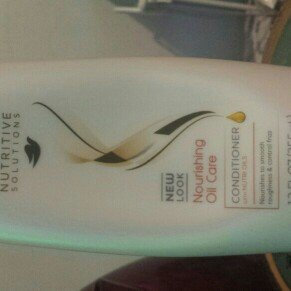 Photo of Dove Damage Therapy Nourishing Oil Care Conditioner uploaded by Nesha U.