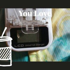 Photo of Vivitar AC/DC LCD Universal Pro Charger uploaded by Matheus B.