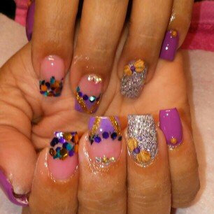 Photo of Bundle Monster 5 Nail Art Manicure Wheels W 3D Designs Glitters Rhinestones Beads uploaded by Maria O.