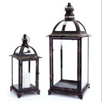 Melrose 2 Distressed Black Pillar Candle Lanterns with Curved Arch & Finial Tops 25.25
