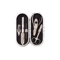 Bey-berk 5 Piece Manicure Set in White Snake Pattern Leather Case.