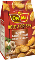 Ore-Ida® Bold & Crispy Roasted Garlic & Herb Homestyle Wedges Seasoned French Fried Potatoes 26 oz. Bag