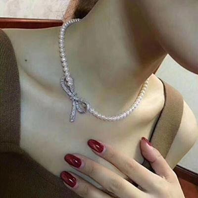 Generic Freshwater_ pearl necklace pendant necklace _bow_section_with_ bright autumn _and_ winter clothing fashion classic _nearly_circular