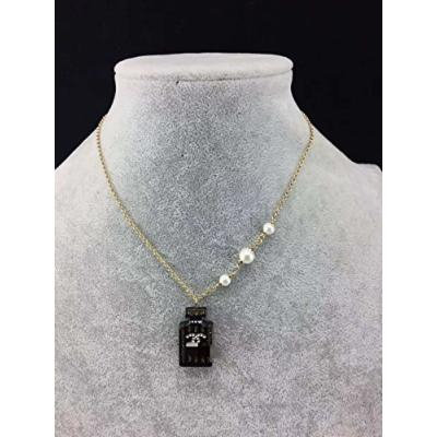 Generic Hong_Di_ jewelry _counters_with_light_ golden necklace pendant _perfume_bottle